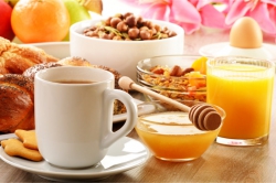 fruits, bread, coffee, honey, cereals, and orange juice